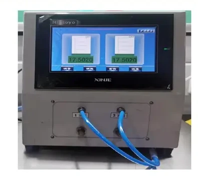 Published equipment photograph: pneumatic comparison measurement with the appropriate tooling.