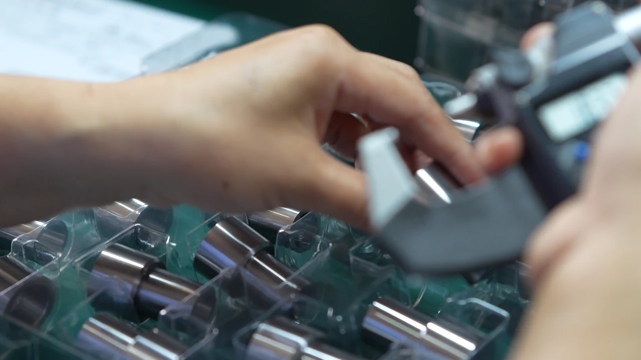 Micrometer inspection of machined sleeves