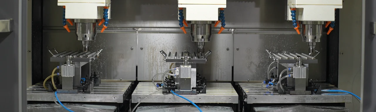 Multi-spindle machining fixtures and work area